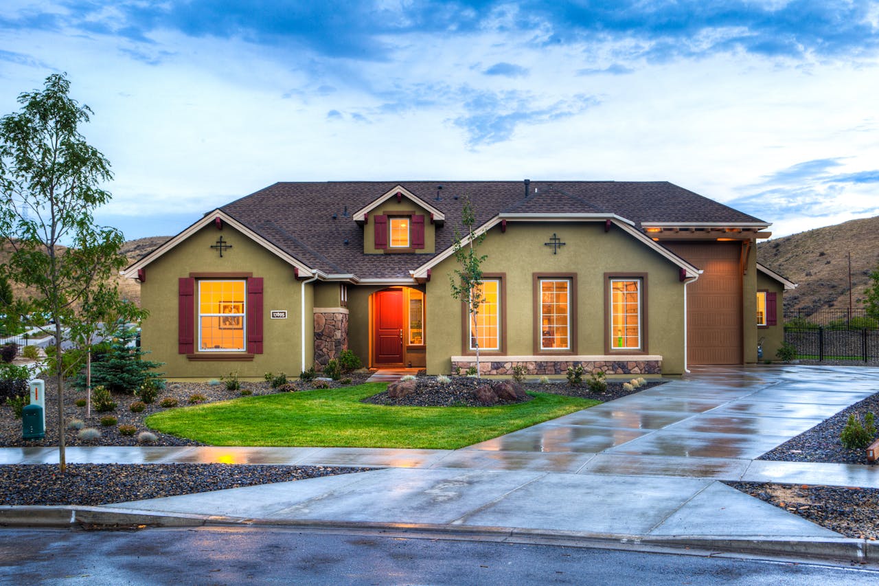 new stucco home at dusk